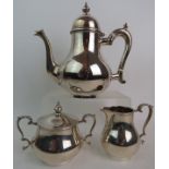 A good Garrard & Co silver three piece tea set in the Queen Anne style, London 1954-55, approx