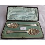 A boxed set of berry spoons with engraved decoration to handles. London 1808 and London 1815,
