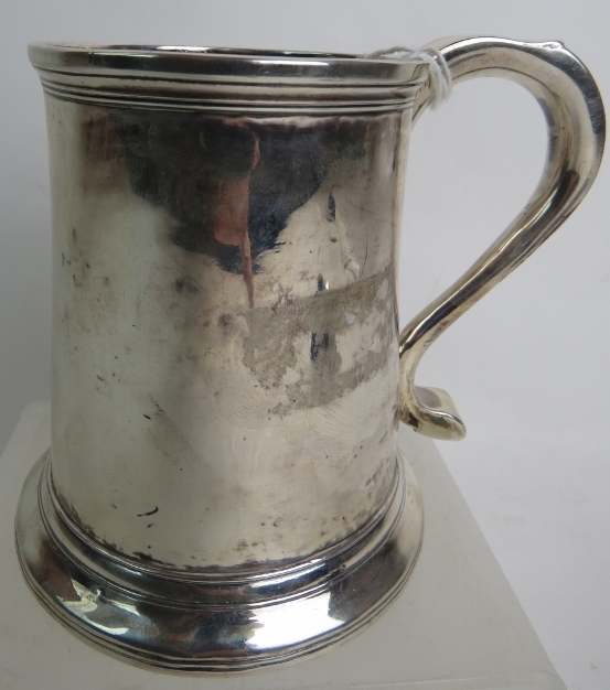 A George III provincial silver mug by John Langlands, Newcastle, 1774/75, of plain tapered