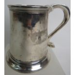 A George III provincial silver mug by John Langlands, Newcastle, 1774/75, of plain tapered