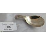 A silver C18th caddy spoon with engraved decoration to handle London 1789, maker Thomas Northcote.
