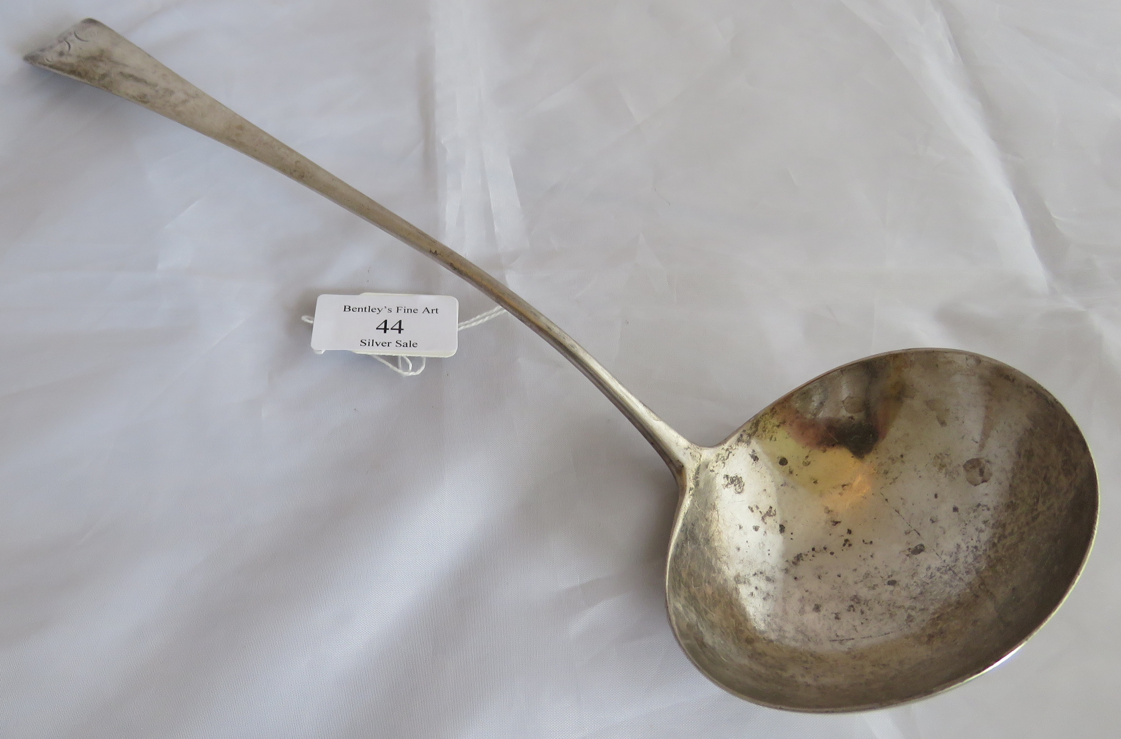 A silver Georgian soup ladle, London 1808, maker T.H. Weight 140 grams, measures 13 inches long, all