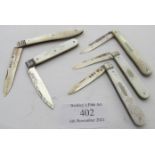 A collection of five silver bladed mother of pearl handle fruit knives, all fully hallmarked, one