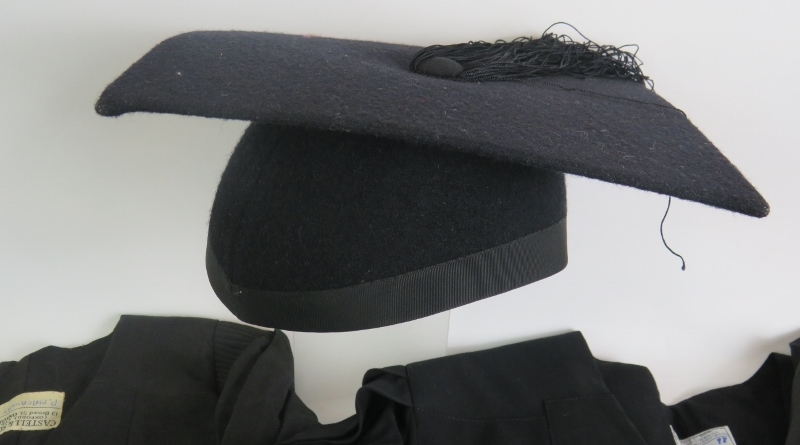 Two black graduation gowns and a mortar board size 6 5/8. (5). Condition report: No issues. - Image 2 of 4