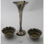 A silver specimen vase with fluted edge, approx 5 1/2" high, weighted, Sheffield 1908, and a pair of