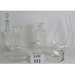 Three contemporary glass carafes, one marked St Clare, plus a cut crystal spirit decanter and a tall