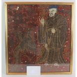 An antique Chinese silk panel with mirror and crewel work decoration depicting a monk and a