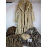 Three vintage fur coats, one with matching hat plus a vintage fur wrap. Condition report: No issues.