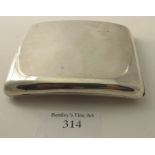 A heavy silver cigarette case, Birmingham 1919, approx weight 4 troy oz/125 grams. Condition report: