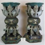 A pair of antique highly ornate glazed stoneware Jardinière stands in the Chinese style both