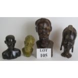 Four decorative carved African tribal busts, three fashioned from hardwood and one from stone. Circa