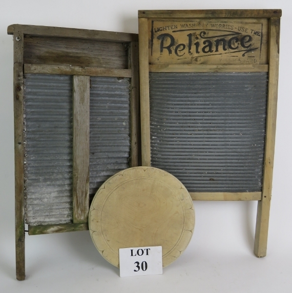 Two vintage wood and zinc washboards one by Reliance and a carved wooden bread board. (3). Condition