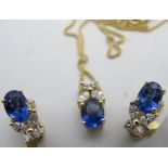 A 18ct yellow gold pendant and clip earring set, each piece set with oval sapphire and four