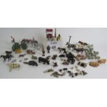 A large quantity of Diecast animals and figures, C1950s, some marked 'Britains'. (qty). Condition