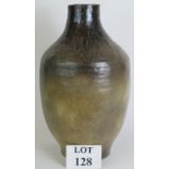 A large studio pottery vase with brown graduated glaze. Signed to base J Maltby, possibly John