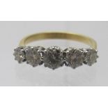 An 18ct yellow & white gold five stone round brilliant cut diamond ring. Diamonds approx 1.40cts,