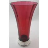 A large cranberry glass vase set in a good silver base, 11" high, London 2001, boxed. Condition