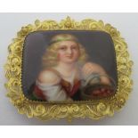 A 19th century gold and Swiss enamel brooch, the rectangular plaque depicting a young girl with