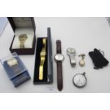 A collection of watches to include a spherical watch brooch, a gentleman's Accurist, boxed, a