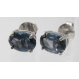 A pair of London blue topaz studs, posts stamped 925, approx weight 1.8 grams. Condition report: