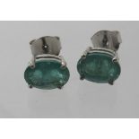 A pair of gem set stud earrings, backs marked 925, approx weight 1.6 grams. Condition report: Good