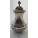 A silver sugar caster of waisted form & half fluting decoration, Chester 1903, approx 6" high,
