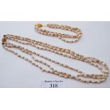 A three strand blister pearl necklace and matching bracelet, each pearl interspersed with a yellow