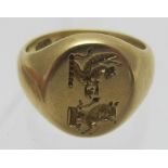 An 18ct gold signet ring with inside inscription 'RTJ from his mother August 1892', approx weight 11