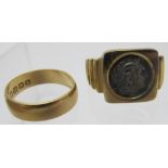 A 15ct gold signet ring inset with coin and an 18ct gold wedding ring. Condition report: Surface