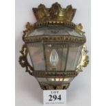 A pierced metal Persian style glazed wall light with mirrored back. Height 43cm. Width 34cm.