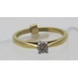 An 18ct gold single stone diamond set ring, diamond approx 0.14cts, approx weight 2.8 grams, size L.