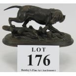 A bronze figure of a hunting dog on plinth, signed Delas Pierre. Height 9cm. Length 18cm.