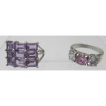 A 925 stamped amethyst ring set with a block of nine baguette cut amethysts, size N and a 925