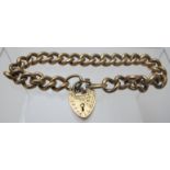 A 9ct gold link bracelet with 9ct gold padlock clasp and safety chain, approx weight 20 grams.