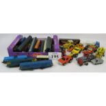 A selection of 'OO' Gauge trains and carriages plus a selection of cast metal toy cars, including