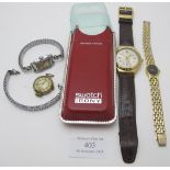 A Swatch watch in original case and three other watches to include a ladies Rotary wristwatch.