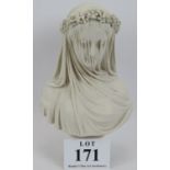 A decorative reconstituted marble bust of a veiled lady. Height 36cm. Condition report: No issues.