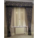 A good quality pair of blue and gold Brocade curtains with fruit pattern. Fully lined with tie backs