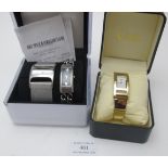 A DKNY white metal wristwatch with receipt and in original box, a stainless steel Guess wristwatch