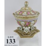 An antique hand decorated covered bowl and stand in the style of Copeland. Richly painted with