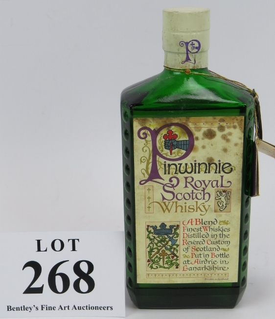 A Bottle of Pinwinnie Royal Scotch Whisky with neck tags, c1970s. Condition report: Some mould to