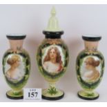A three piece continental opaline glass garniture set comprising a covered vase and two others. Each