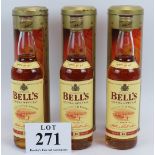 3 bottles of Bells 8 year old Scotch Whisky in presentation tins 70cl 40%. (3). Condition report: