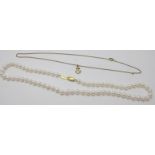 A strand of pearls with a 9ct gold clasp, approx 18" long and a 9ct gold anchor pendant on a fine