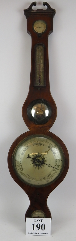 A 19th Century mahogany cased wheel barometer with silvered dial. Height 96cm. Condition report: