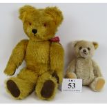 A large vintage jointed plush teddy bear, possibly by Merrythought and a smaller Steiff teddy bear