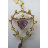 A 9ct yellow gold pendant set with centre amethyst, approx 10mm x 10mm, a small drop amethyst and