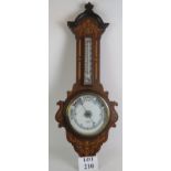 A good quality Edwardian barometer in inlaid mahogany case, signed Thick, Frome. Height 87cm.