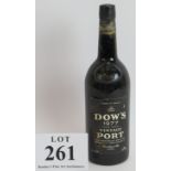 One bottle of Dow's silver Jubilee 1977 vintage port 75cl. Condition report: Level low neck. Some