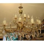 A good quality crystal and gilt brass 12 branch chandelier with 18 bulb holders. Chandelier height